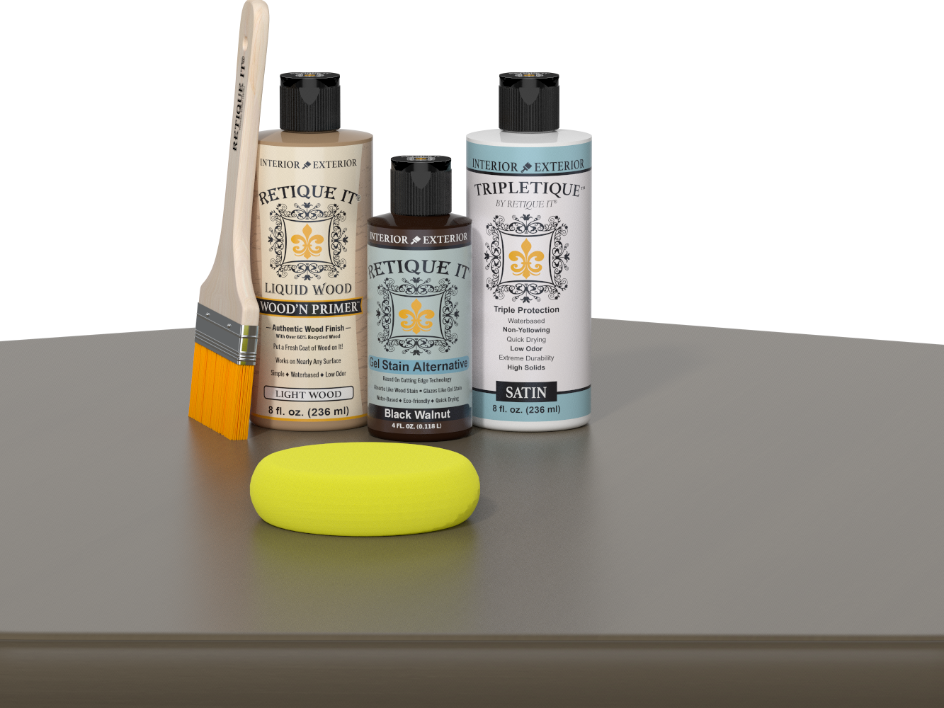 Retique It Black Walnut Kit with Satin Tripletique, Light Wood Wood'n Primer, Black Walnut Gel Stain Alternative, paintbrush, and yellow sponge on a tabletop.
