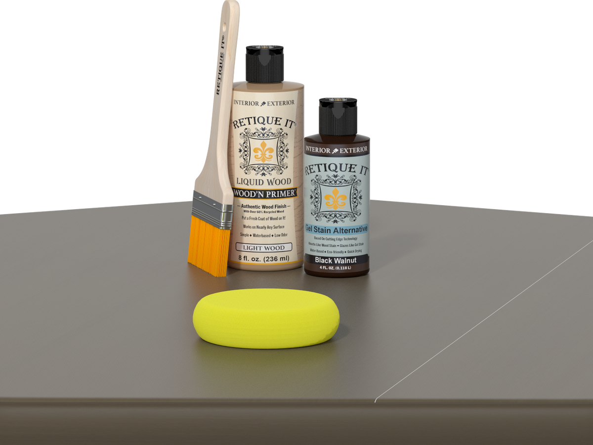 Retique It Black Walnut Kit with Light Wood Wood'n Primer, Black Walnut Gel Stain Alternative, paintbrush, and yellow sponge on a tabletop.