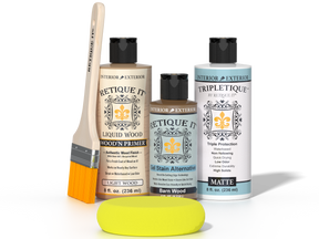 Retique It Barn Wood finishing kit with PolyTique It Matte top coat, Liquid Wood Wood'n Primer, Barn Wood Gel Stain Alternative, paintbrush, and yellow sponge.