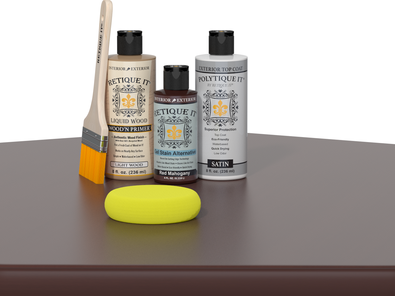 Retique It® Light Wood Wood’n Primer with Red Mahogany Gel Stain Alternative, satin topcoat, brush, and yellow sponge on a tabletop.