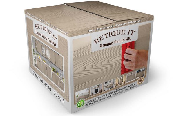 Retique It Grained Finish Kit box showing a hand using a red wood graining tool to create a light wood grain finish, with cabinet project photos and up to 100 square feet of coverage.