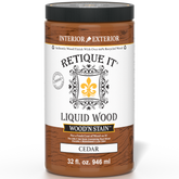 Retique It Liquid Wood Wood'n Stain in Cedar, 32 oz, showcasing the stain application on wood for a rich cedar finish.