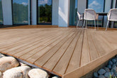 Retique It Bare Wood Kit exterior top coat in gloss finish applied to decking, showing smooth, shiny wood surface.