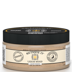 Retique It® Liquid Wood interior paint in 8oz light finish, shown in a jar, ideal for wood surface transformations.