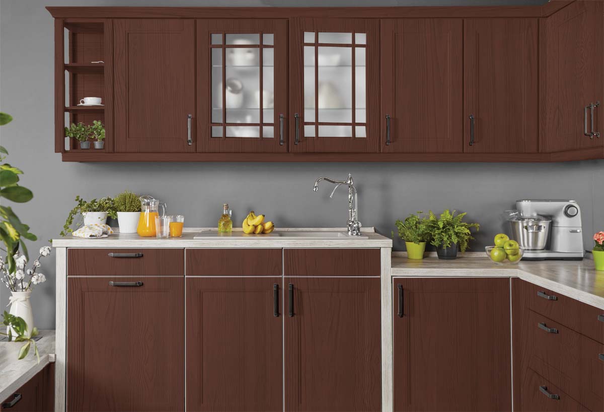 Retique It® Wood'n Finish Kit in Red Mahogany, exterior top coat for wood, shown on kitchen cabinet grained surface.