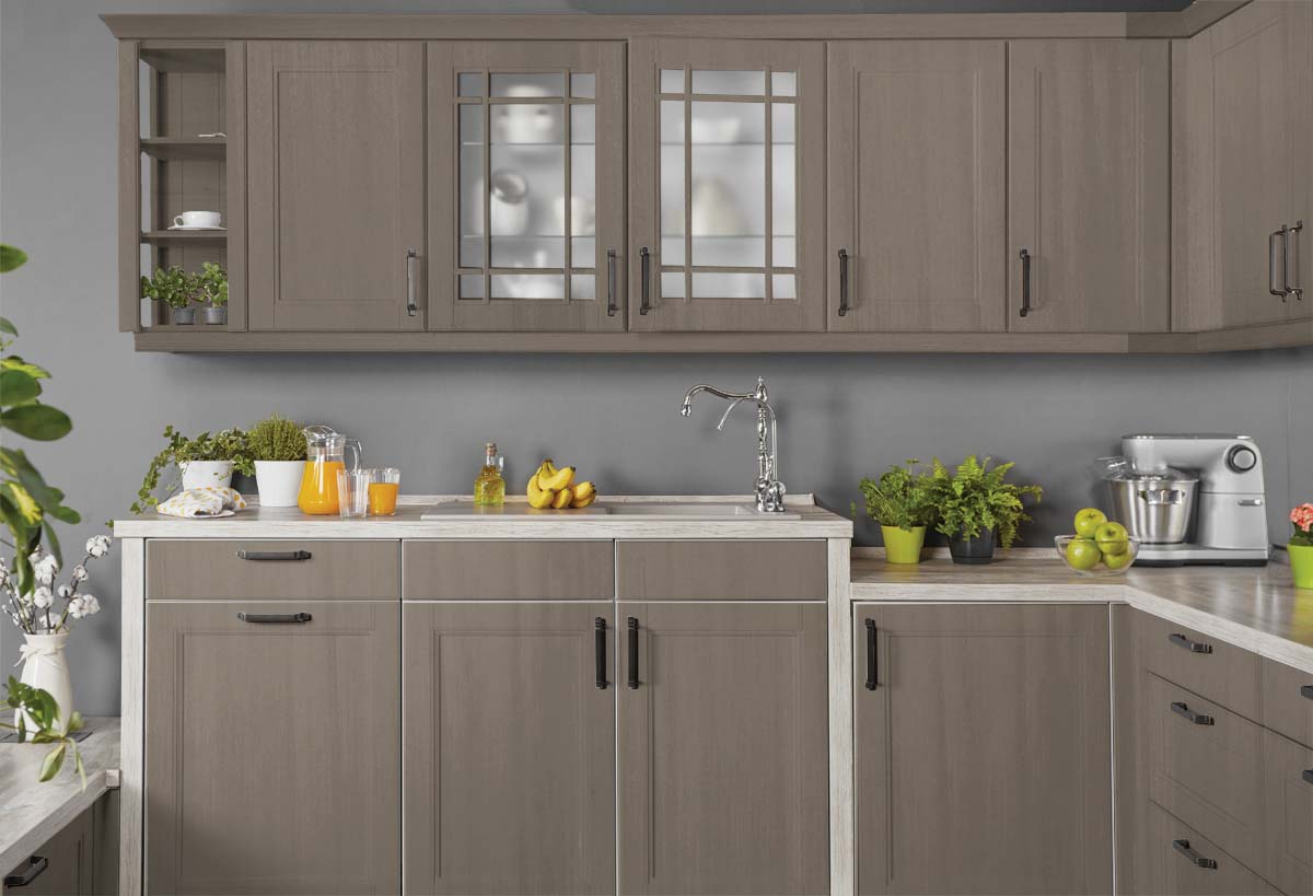 Retique It wood finish kit with smooth gray top coat applied to kitchen cabinets for a sleek, modern look.