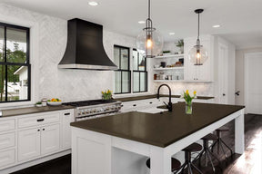Retique It® Multi-purpose Smooth Finish Kit (Large) in Charcoal for interior wood surfaces, displayed on a kitchen countertop.