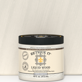 Close-up of 16oz bottle of Retique It® Liquid Wood in Bleached for interior use, showing the product label and packaging.