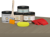 Retique It® Wood'n Kit Medium Drift Wood exterior top coat on a table, showcasing natural wood finish and matte protective layer.