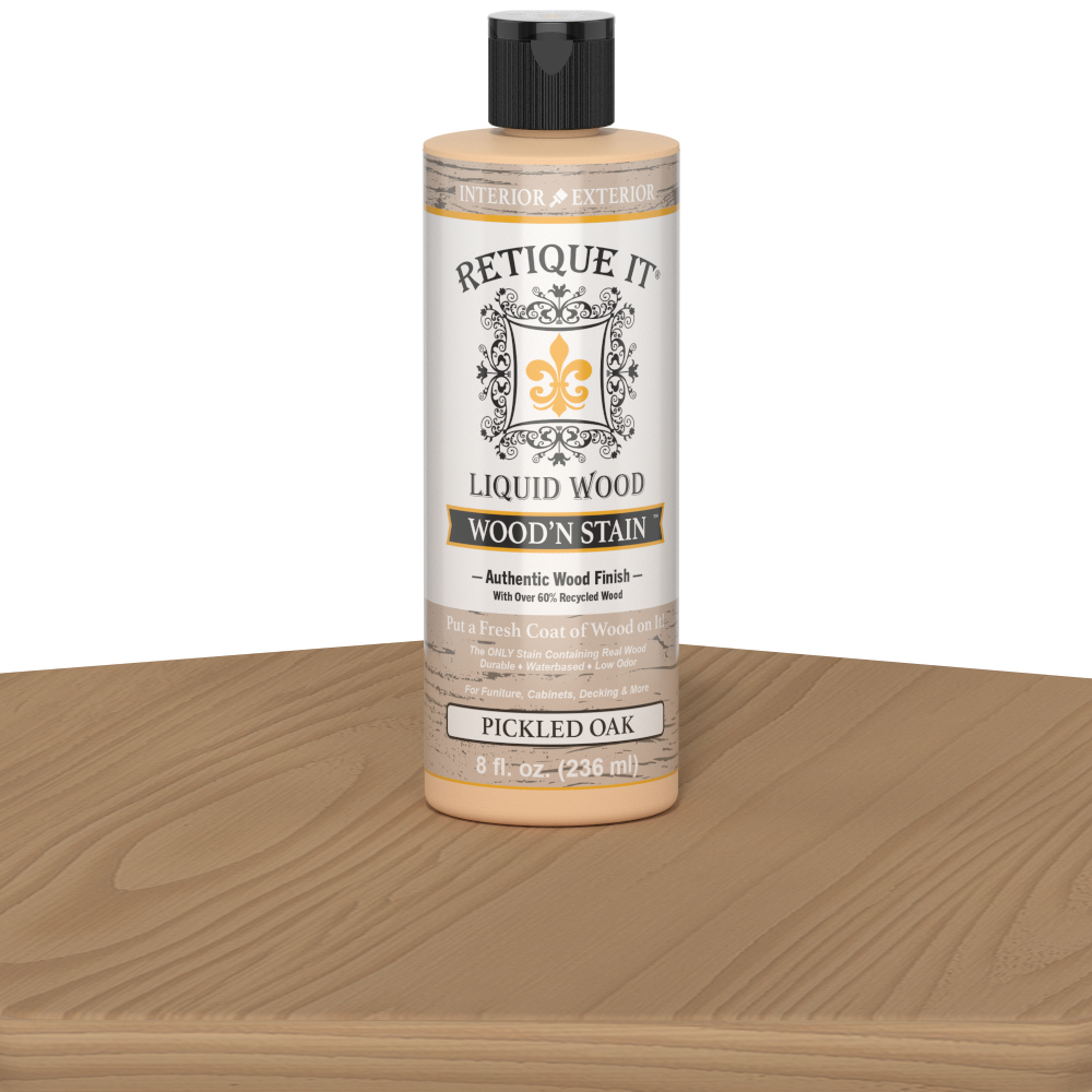Retique It Liquid Wood Wood'n Stain in Pickled Oak, 8 oz jar, showcasing the stain's light oak color and smooth application.