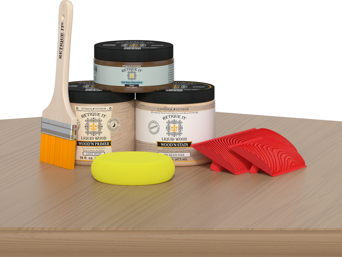 Retique It® Wood'n Kit in Pickled Oak, a multi-purpose wood finish kit, showing wood stain and finishing tools on a table.