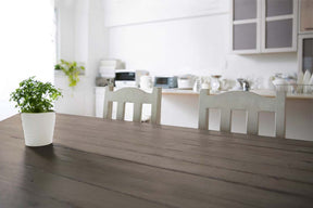 Retique It Multi-purpose Smooth Finish Kit in Harbor Gray applied to a wooden tabletop with a sleek, even finish.