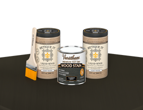 64 oz Retique It Liquid Wood kit with Varathane Carbon Gray stain and a paintbrush on a matching finished tabletop.