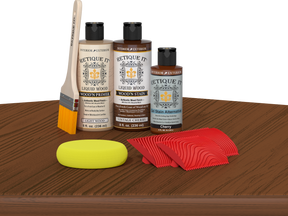 Retique It® Wood'n Finish Kit in Vintage Cherry, a multi-purpose wood finishing kit with a cherry wood finish on a table.