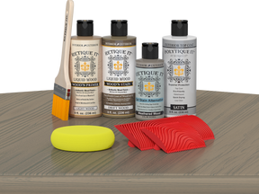 Retique It® Wood'n Finish Kit with driftwood exterior top coat on a table, showcasing natural wood finish for outdoor projects.