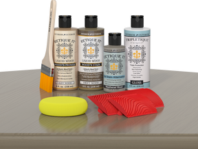 Retique It® Wood'n Finish Kit with driftwood design applied to a table surface, showcasing natural wood grain and interior top coat.