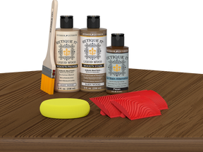 Retique It® Wood'n Finish Kit in Modern Walnut on table, showcasing multi-purpose wood finishing set with applicators and tools.