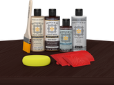Retique It® Wood'n Finish Kit in Red Mahogany with exterior top coat, showing application on wood surface.