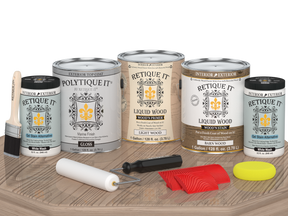 Retique It® Wood'n Kit French Oak exterior top coat in gloss finish, four large containers of wood finish on a table.