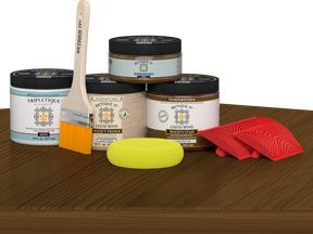 Retique It® dark pecan countertop kit on kitchen island, featuring stain samples and application tools for kitchen remodels.