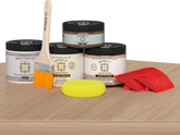 Retique It® Wood'n Finish Kit in White Oak for exterior top coating, featuring applicator and wood sample on a table.