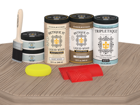 Retique It® Wood'n Cabinet Kit in French Oak stain, featuring 12 grained cabinet doors with matte finish on a table.