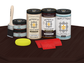 Retique It® Wood'n Finish Kit with four large red mahogany stain bottles and matte finish on a tabletop surface.