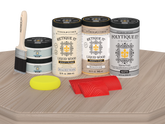 Large Sun Bleached Wood'n Kit by Retique It® for exterior wood finishing with matte top coat, displayed on a table.