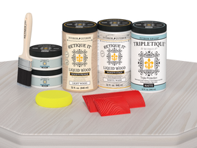 Retique It® Wood'n Cabinet Kit in White Wash stain, featuring 12 grained cabinet doors with matte finish on a tabletop.