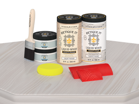Retique It Wood'n Cabinet Kit with 12 white wash grained door stains, displayed on a table showing wood grain detail.