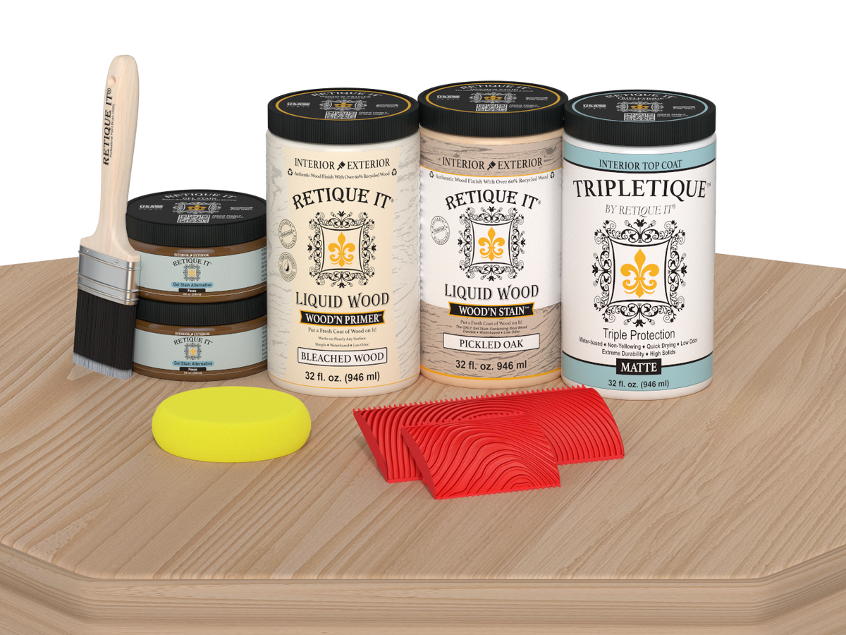 Retique It® Wood'n Finish Kit with four large white oak stain bottles and matte finish, shown on a table surface.