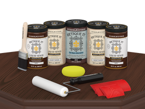 Retique It® Wood'n Cabinet Kit Java stain with 24 grained cabinet doors displayed on a table for a natural wood look.