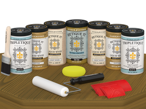 Retique It Wood'n Cabinet Kit with Old Oak stain, featuring 24 grained cabinet doors and a matte finish, displayed on a table.
