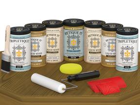 Retique It® Wood'n Cabinet Kit in Old Oak stain showing 24 grained cabinet doors with satin finish on a table.