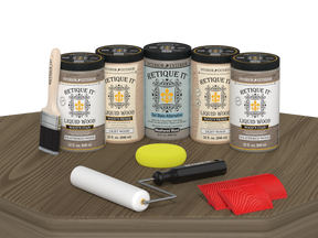 Retique It Weathered Wood Kit with Liquid Wood, Weathered Wood Gel Stain Alternative, yellow sponge, red graining tool, roller, and brush.