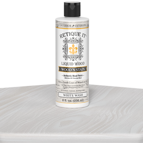 Retique It Liquid Wood Wood'n Stain in White Wash, 8 oz bottle, showing the stain applied on wood surface for a light,washed finish.