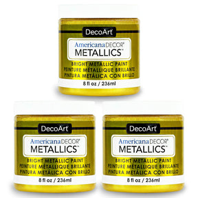 Three bottles of DecoArt Metallics 24K Gold paint featuring shiny gold metallic finish for arts and crafts projects.